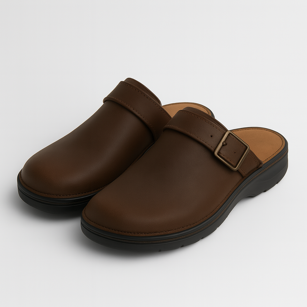 Leather open-back slip-on clogs with an adjustable side buckle and cushioned sole for everyday wear.