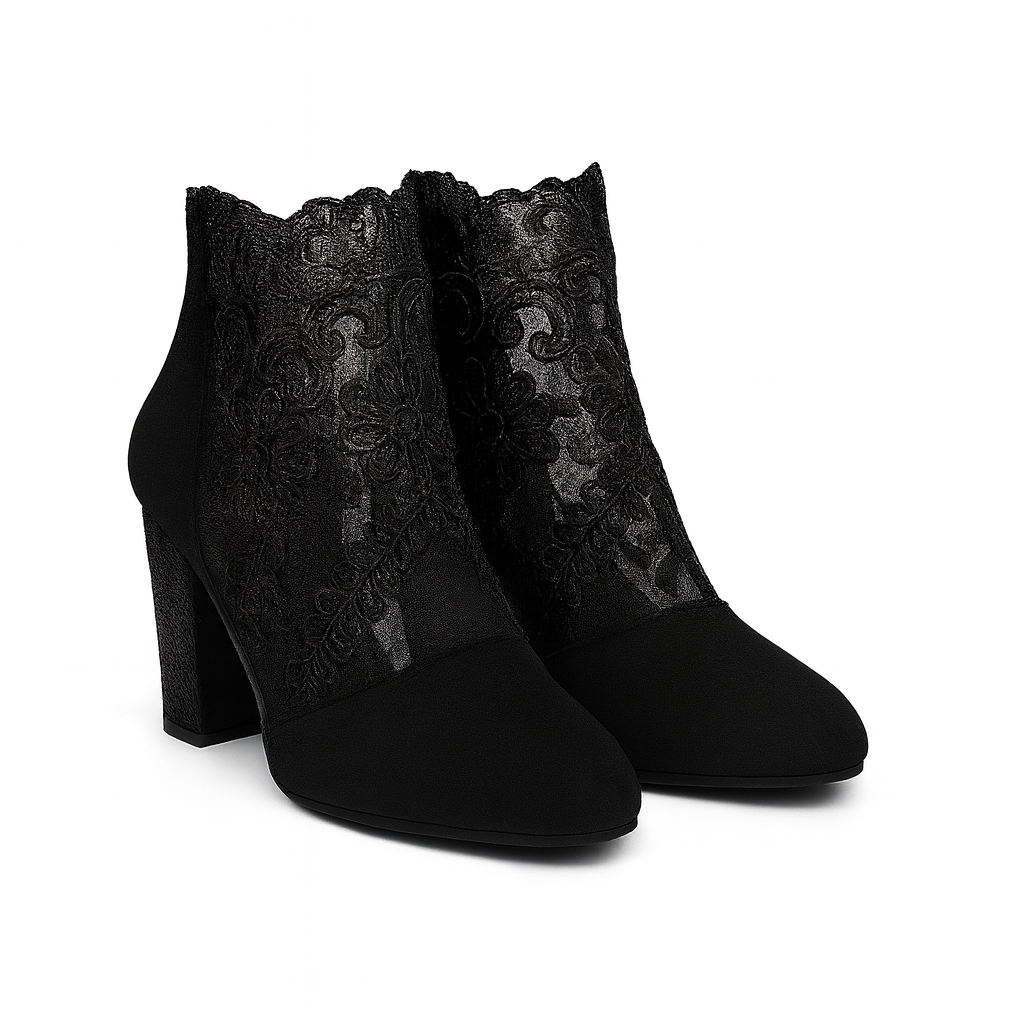 Heeled ankle boots with black embroidered lace panels and block heels.