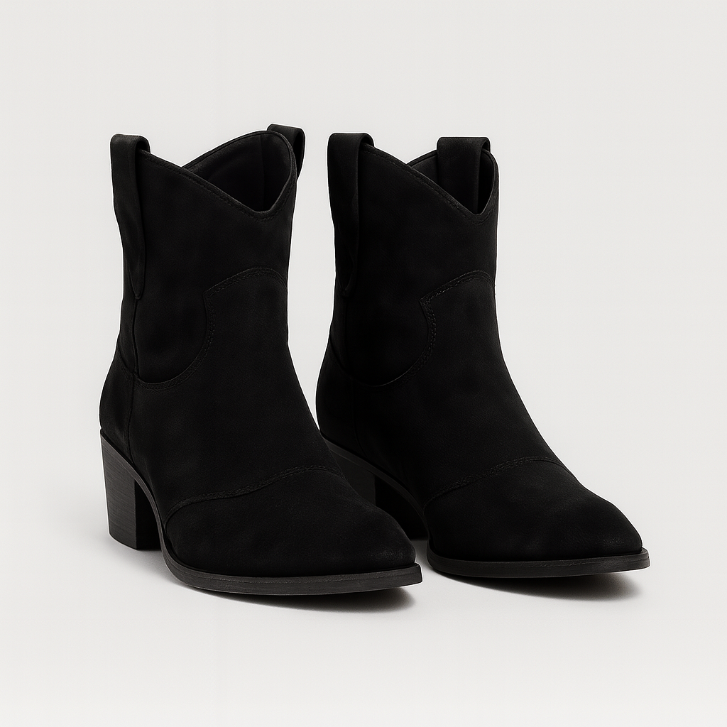 Suede Western-style ankle boots with curved topline and gently distressed soles.