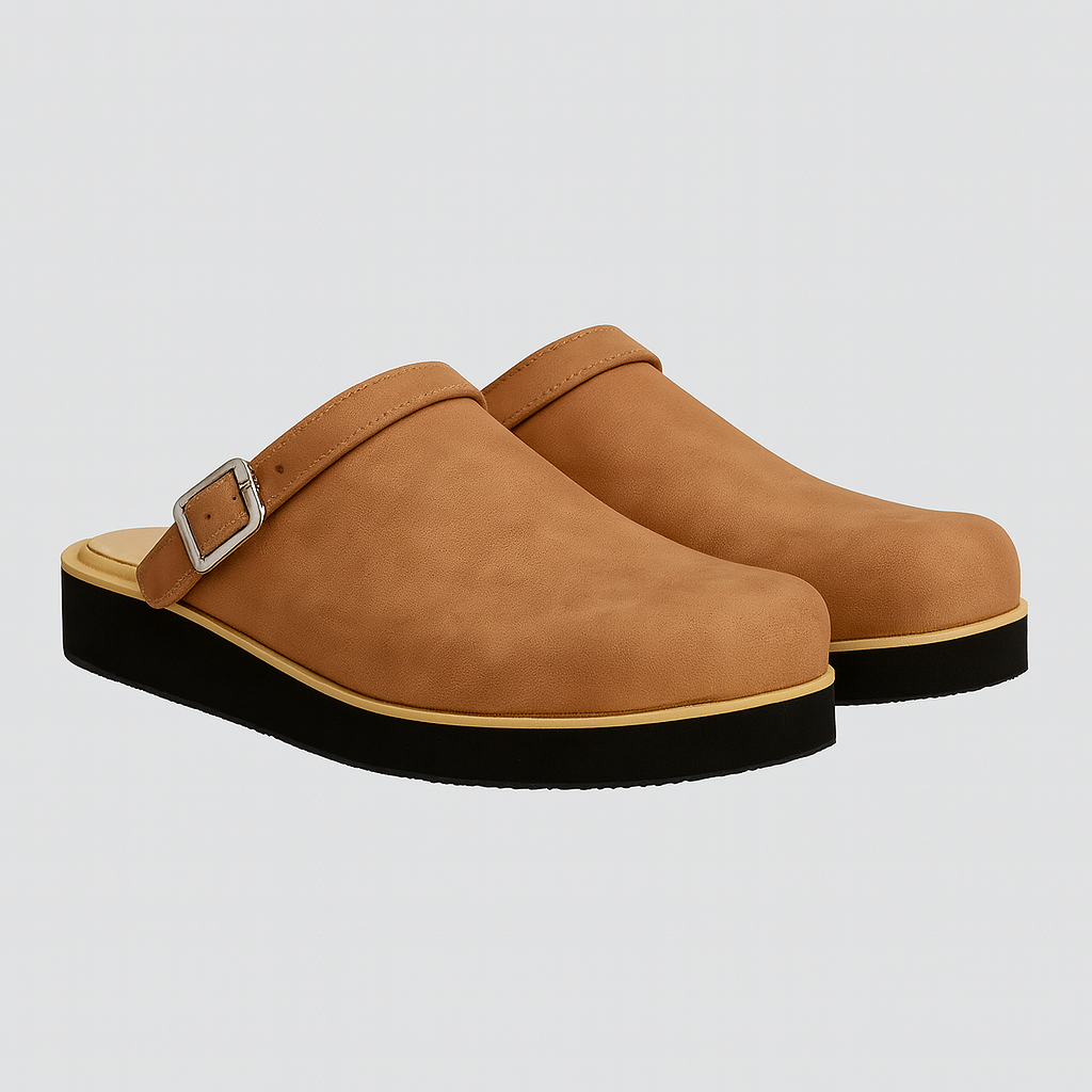 Closed-toe clogs with an adjustable side buckle and a cushioned sole designed for easy everyday wear